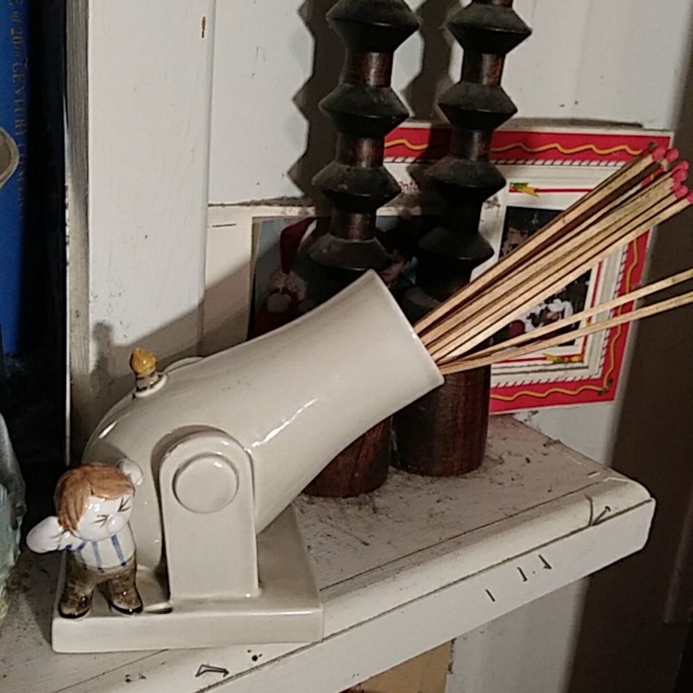 Fritz and Floyd's " Firepower" vintage 1977 longmatch Fireplace Holder